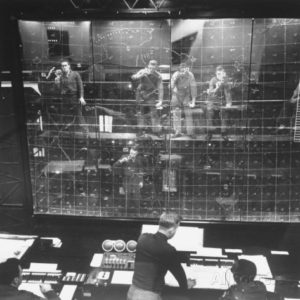 al-fenn-plotters-writing-data-backward-on-plotting-board-with-luminous-pencils-air-defense-control-center
